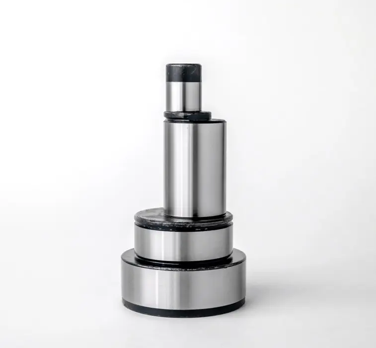A metal shaft component with a stepped design, featuring multiple cylindrical sections of varying diameters, displayed on a white background.