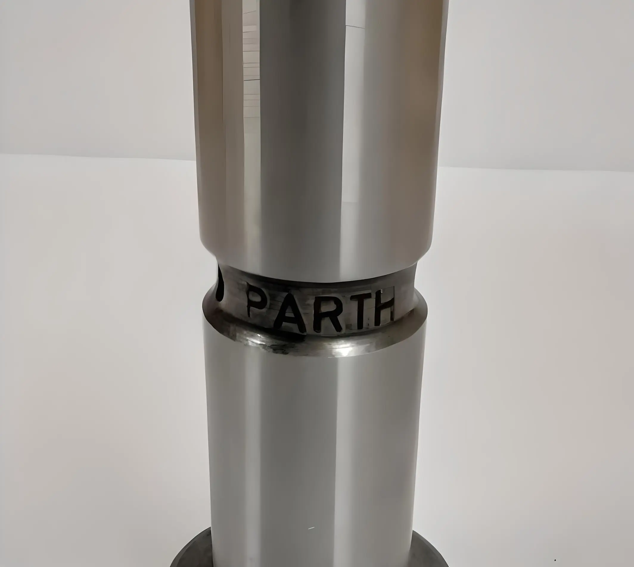 Side view of a cylindrical metal mushroom tappet with the brand 'PARTH' engraved on it, displayed on a white background.