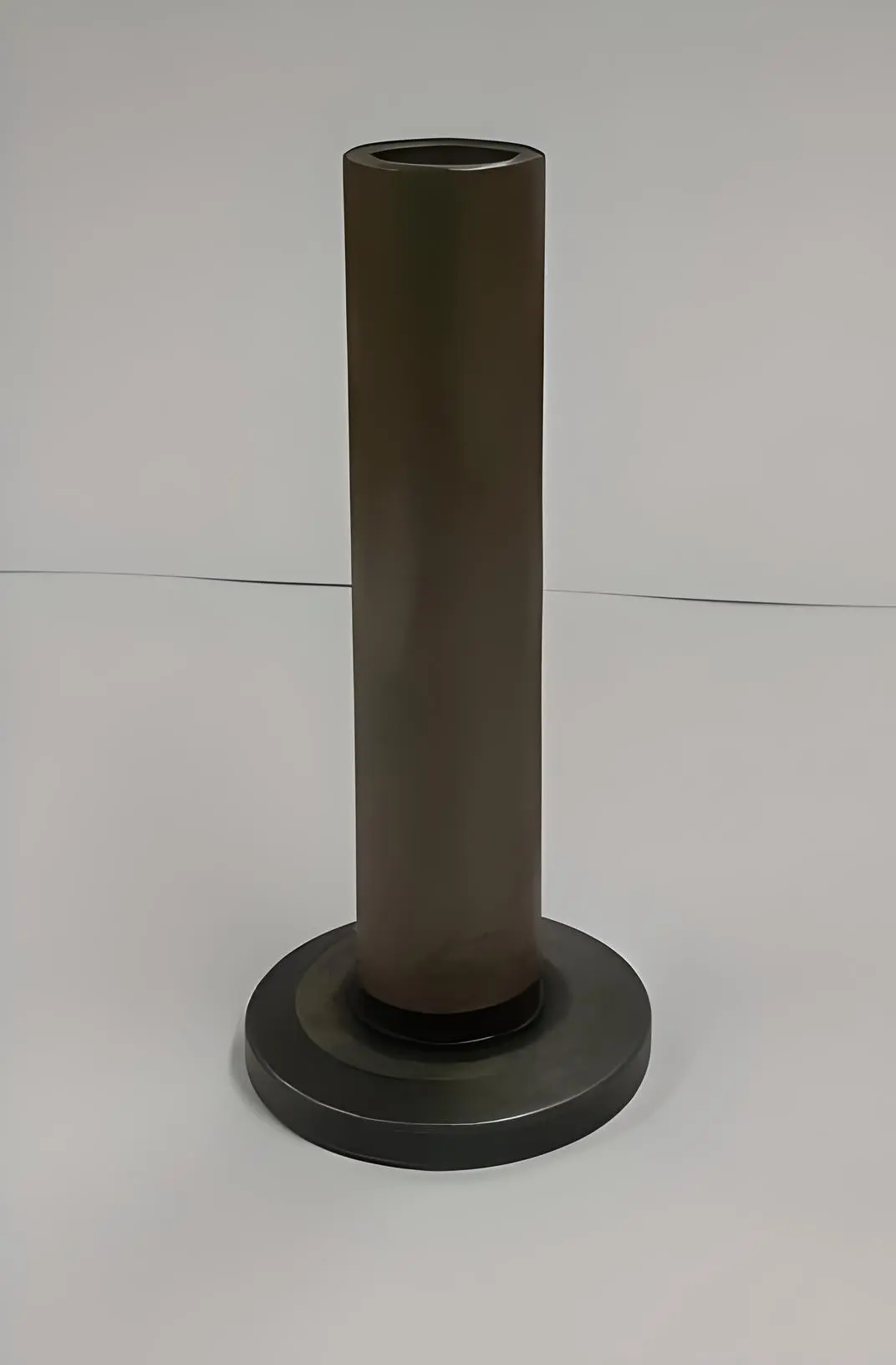 Front view of a cylindrical metal valve tappet, displayed on a white background.