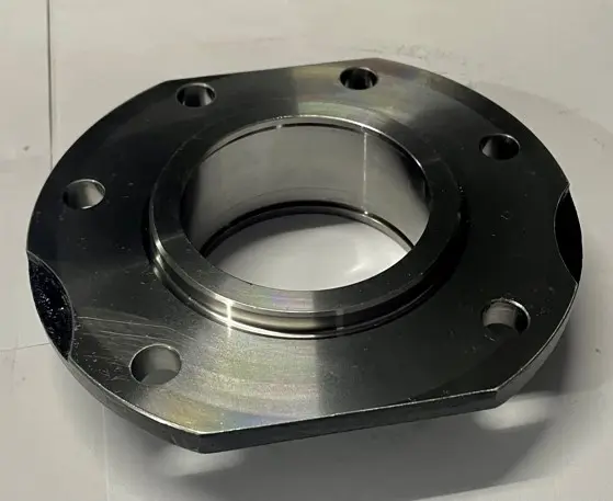 A single metal flange component with multiple bolt holes, displayed on a white background.