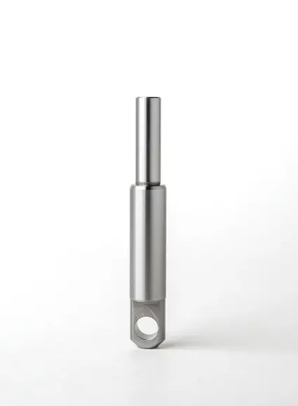 A metal pin component with a smooth end and a hole at the base, displayed on a white background.