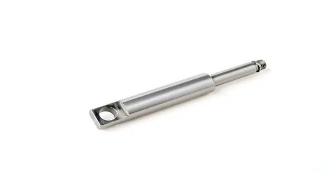 A metal pin component with a threaded end and a hole at the base, displayed on a white background.