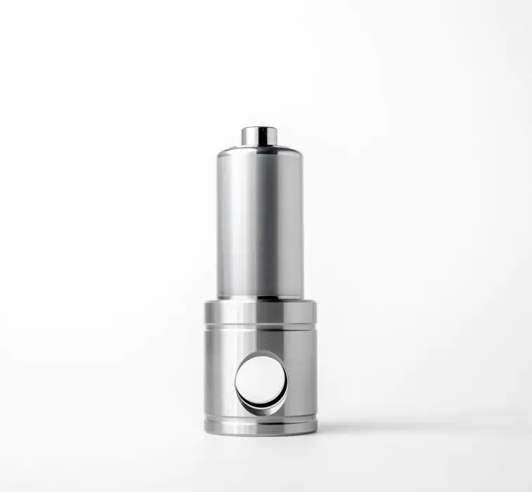 A metal piston guide component for pumps, featuring a cylindrical shape with side holes and a smooth top, displayed on a white background.